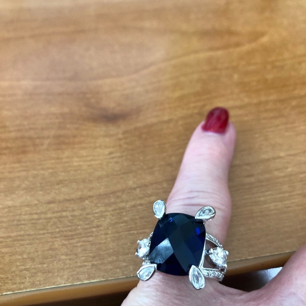 Silver ring with blue stone
